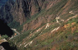 Mini-buses follow a serpentine road to the heights of the ruins.