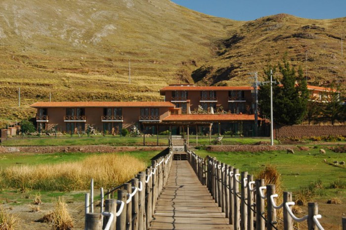 View of hotel from boardwalk to Lake Titicaca, Casa Andina Private Collection Puno, Lake Titicaca, Peru