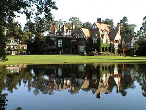 Estancia Villa Maria built in the Norman-Tudor style, complete with lake and guest house on the left.